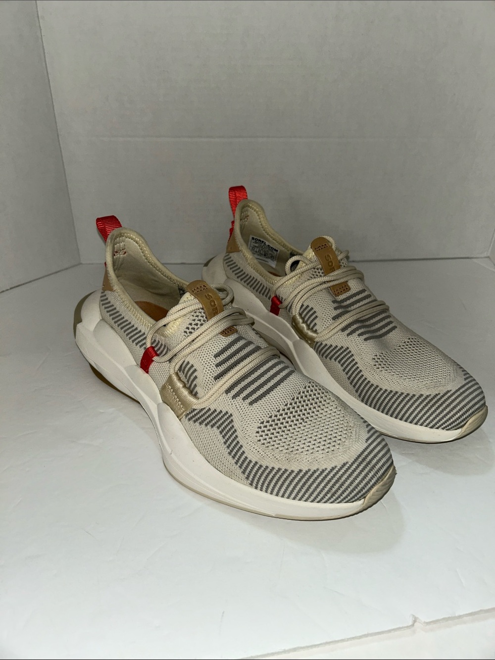 Sorel Beige Knit Slip-On Sneakers with Red Pull Tabs